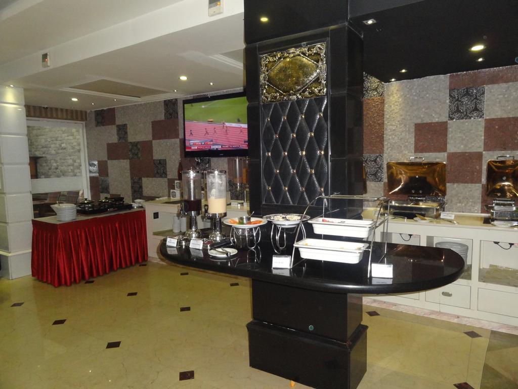 The Pgs Vedanta Hotel Kochi Exterior photo